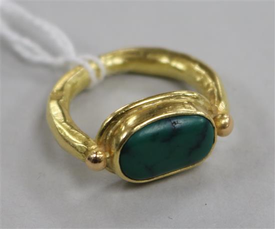 A modern antique style 18ct gold and cabochon turquoise? ring, size K.